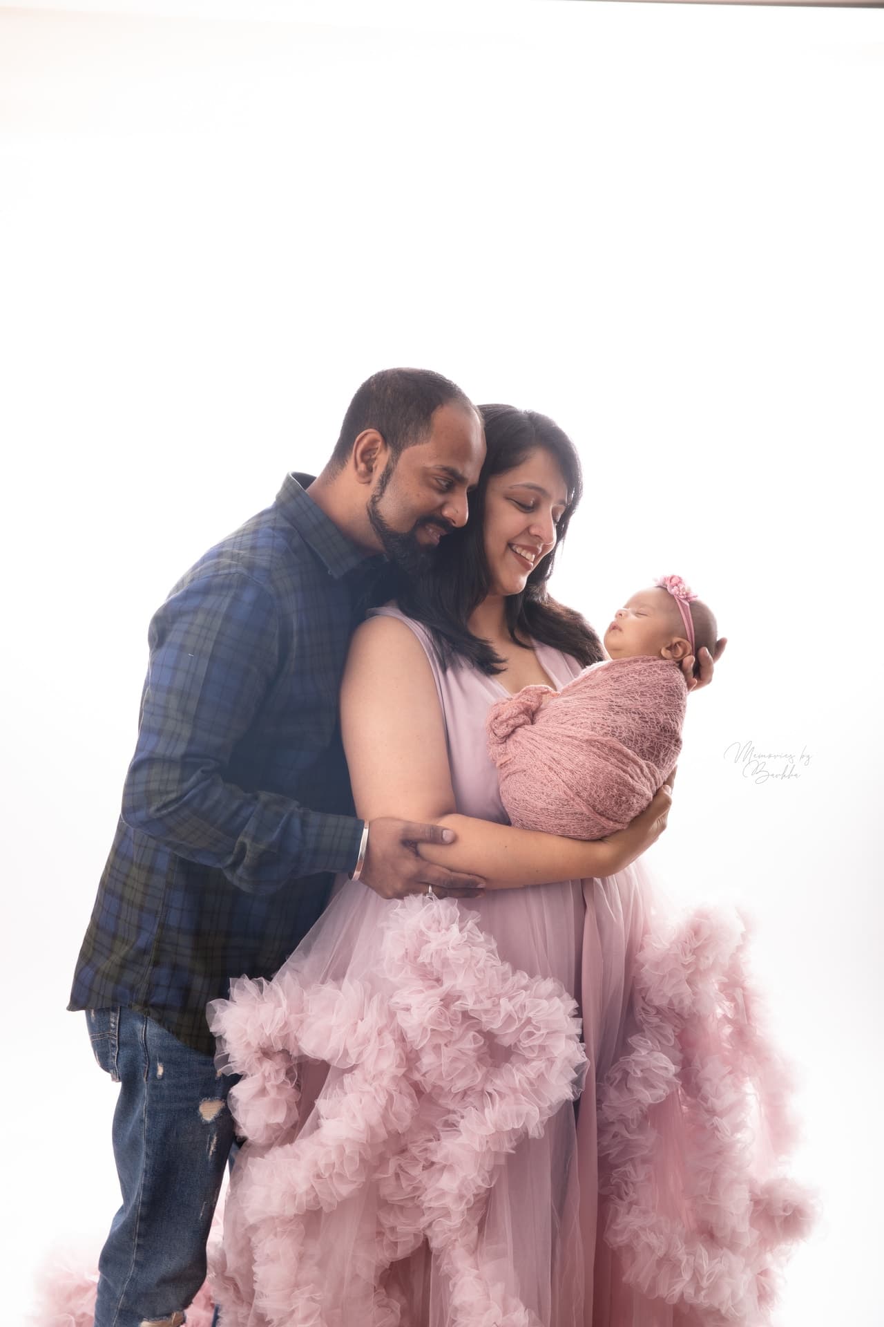 Parents with newborn baby — family photography